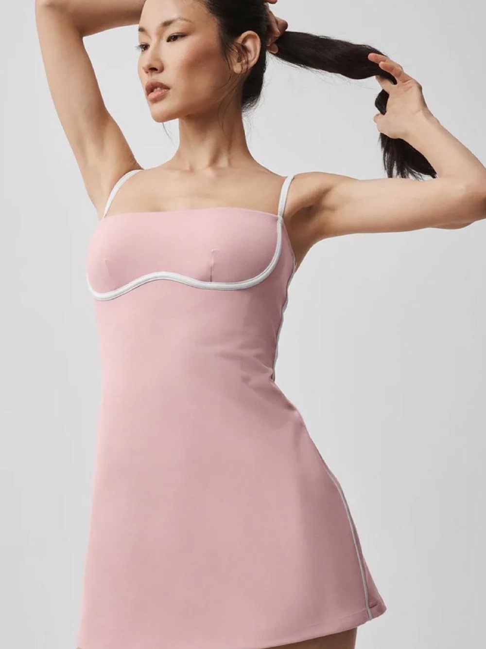 Alo Yoga Airbrush Streamlined Mini Dress in Pink Quartz/White.